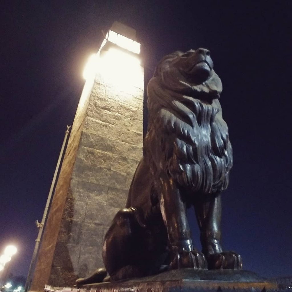 lion statue at Qasr El Nil bridge in downtown Cairo