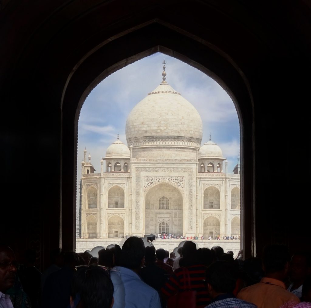 the crowd is rushing to see the Taj Mahal