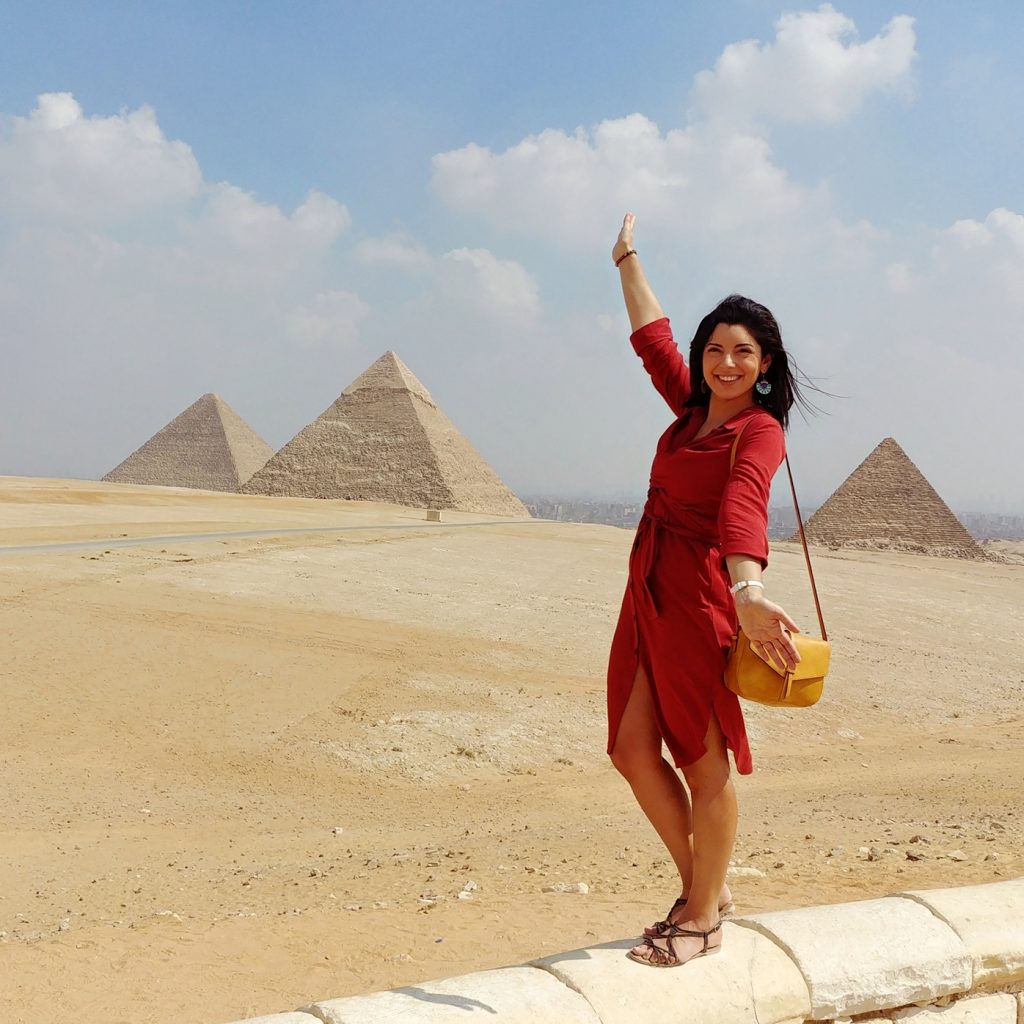 girl with pyramids of Cairo