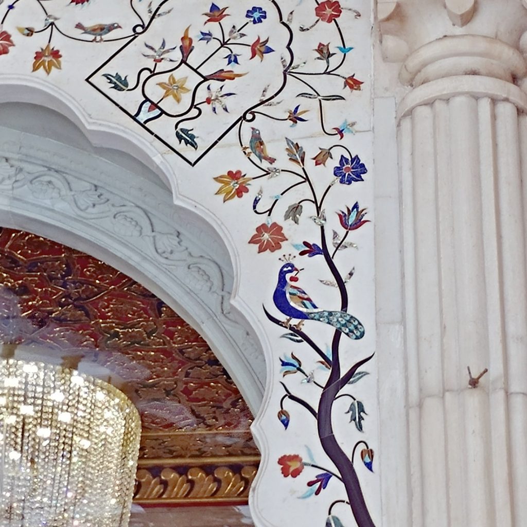 the main building has so many wall decoration with white marble and precious stones