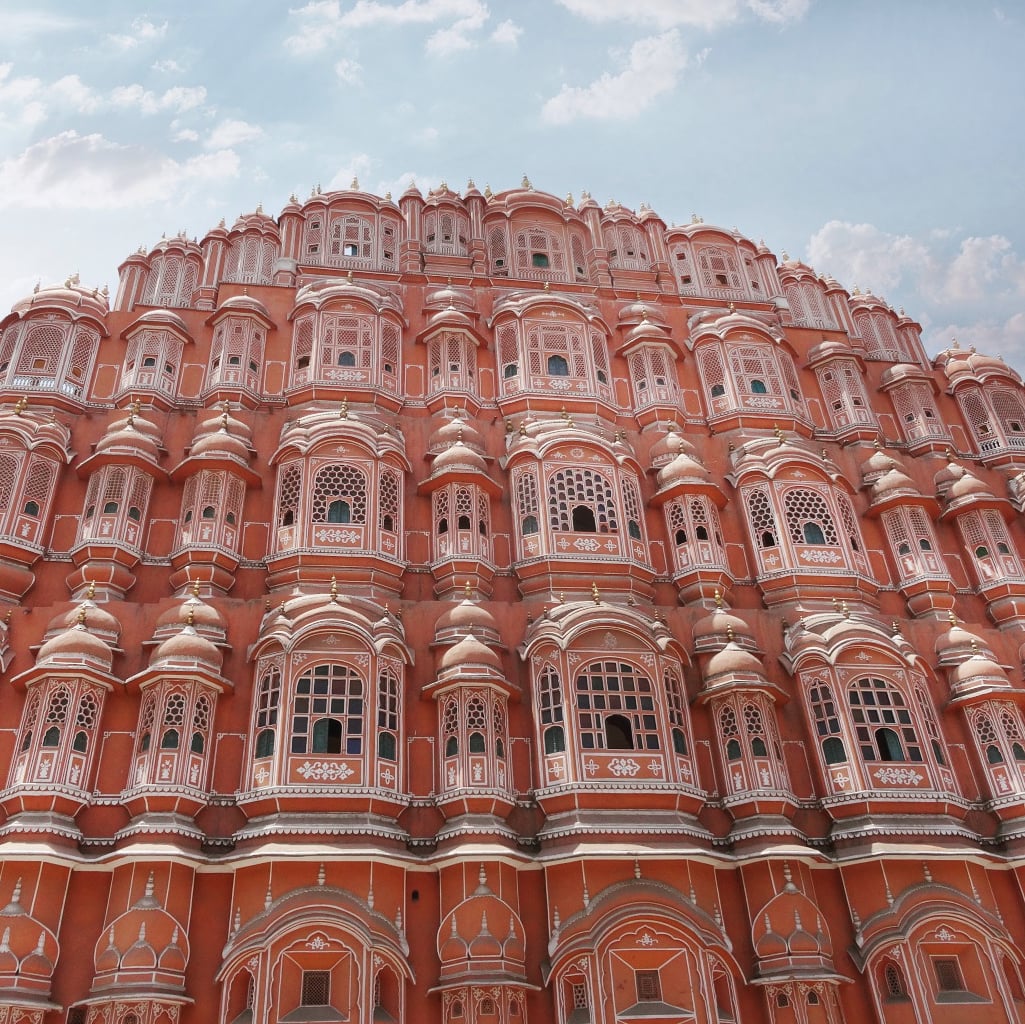 one of the best place to see in Jaipur - view from the street of the pink sandstone Palace of the Winds