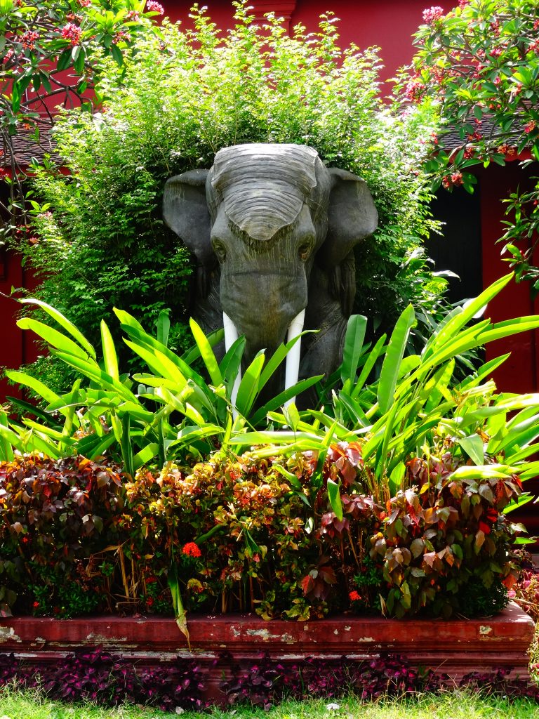 an elephant statue at the entrance of the museum